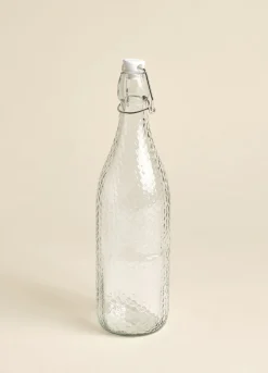 Bottiglia in vetro martellato