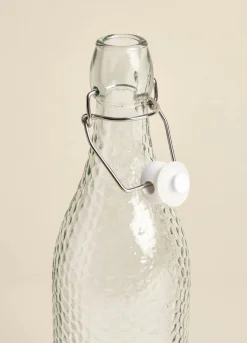 Bottiglia in vetro martellato