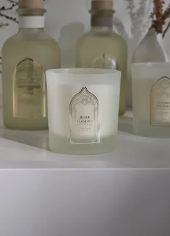 Candela in vetro rosa e gelsomino