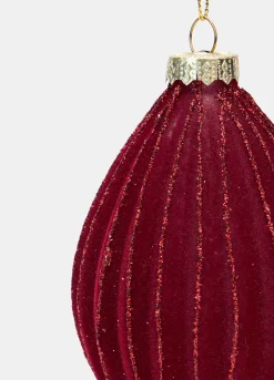 Pallina allungata rivestita in velluto