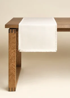 Runner antimacchia con frange