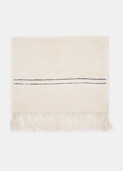 Tappetino per il bagno in cotone con frange