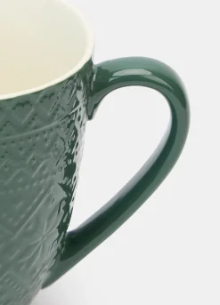 Tazza in ceramica con rilievo