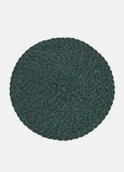 Tovaglietta rotonda intrecciata con dettagli lucidi