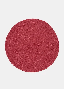 Tovaglietta rotonda intrecciata con dettagli lucidi